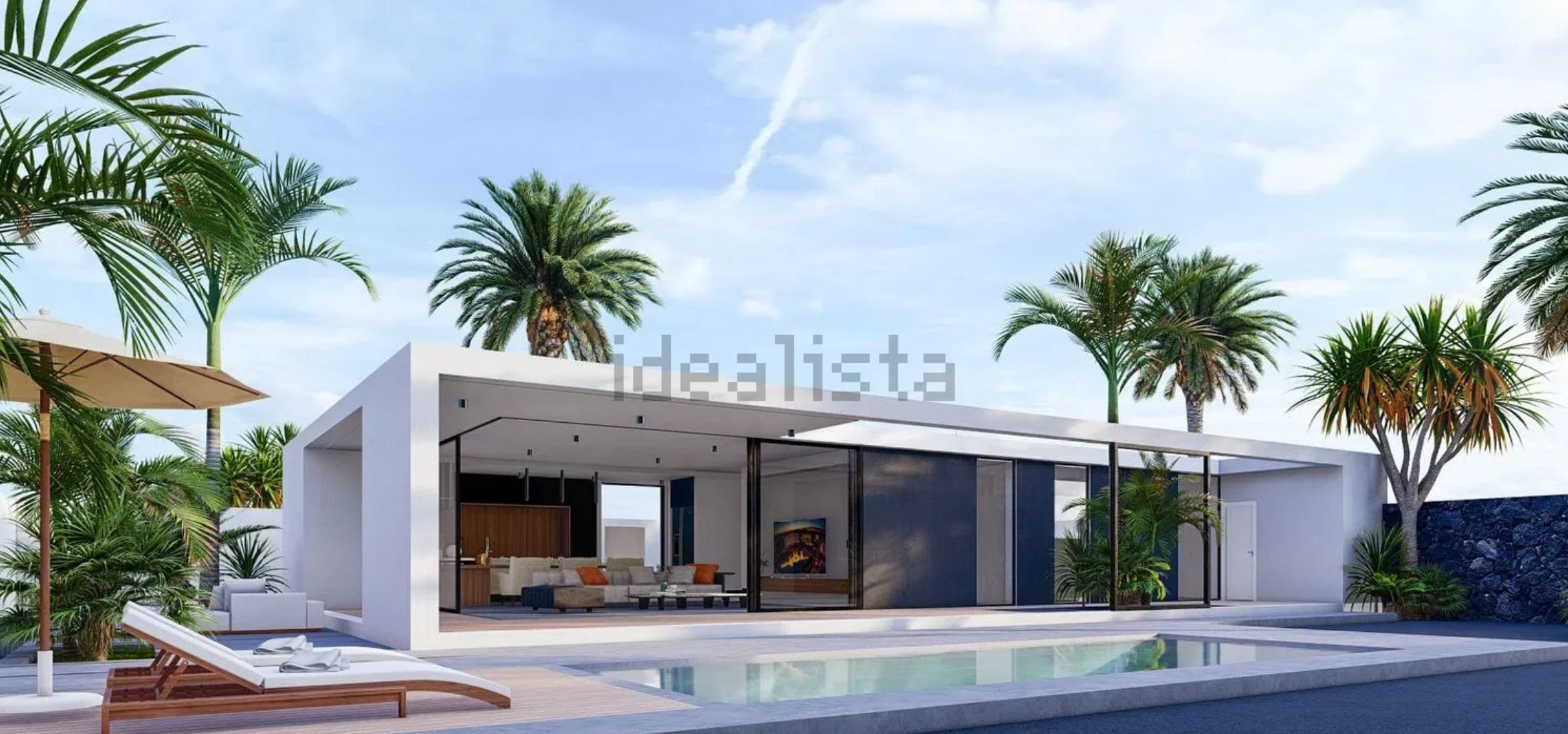 Fachada y piscina de una villa