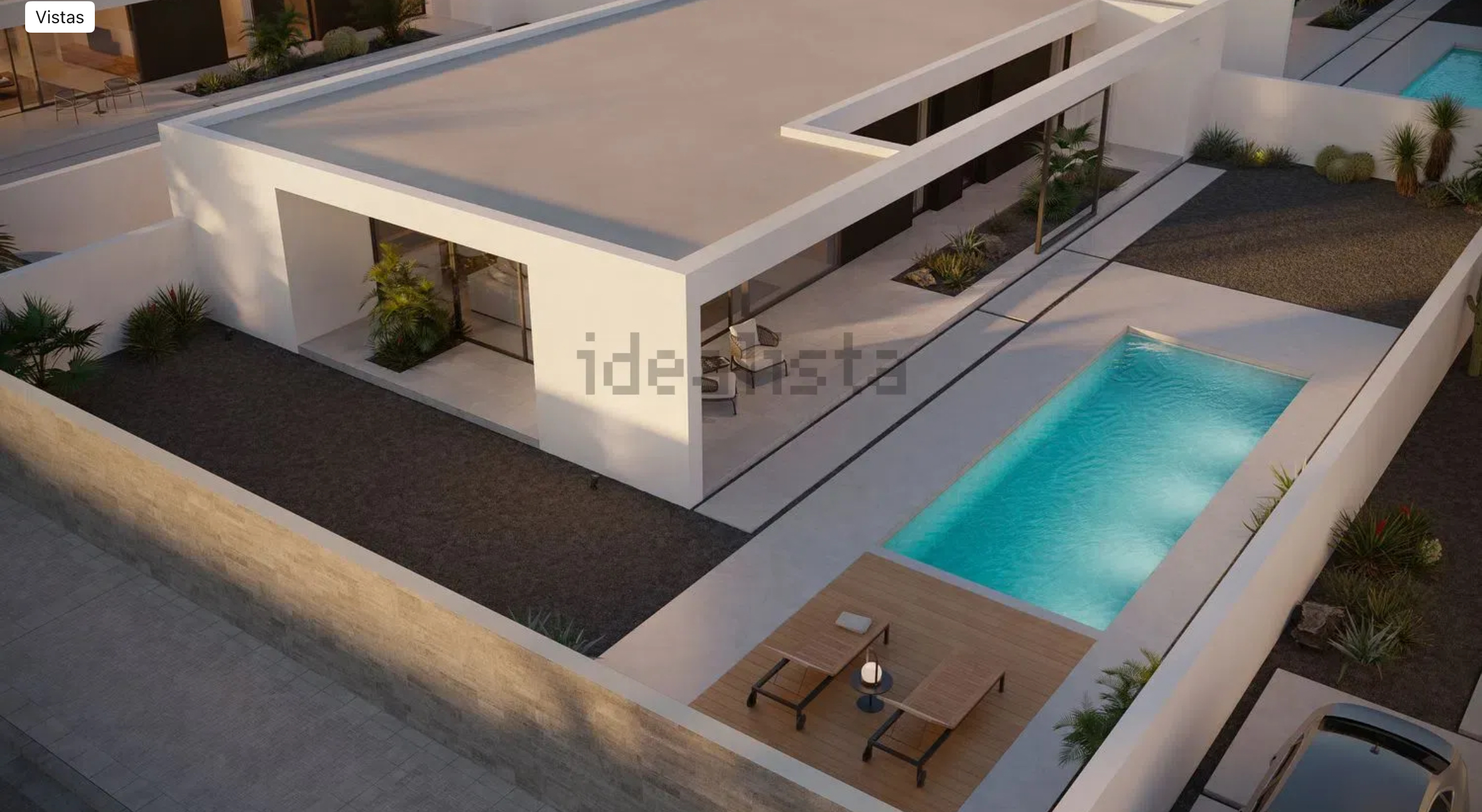 Vista aérea de una villa con piscina
